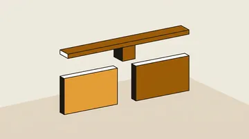 Two blank cards under a level balance beam
